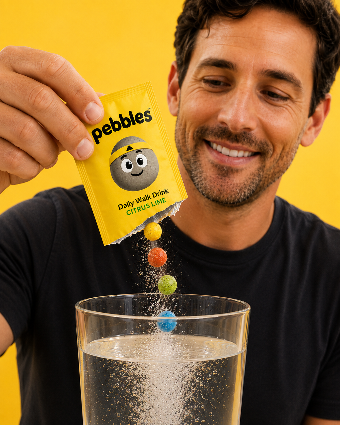 Man pouring colorful Pebbles Citrus Lime tablets into a glass of water